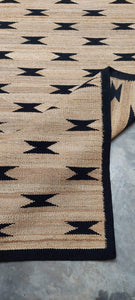 Handwoven Jute Rug with Black Ikat Pattern – Natural Flatweave Design