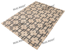 Load image into Gallery viewer, Handwoven Jute &amp; Wool Rug with Interlocking Geometric Pattern - Natural &amp; Black
