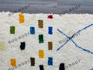 Modern Moroccan Azilal Rug | Handwoven Wool Rug with Bold Blue Geometric Motifs