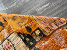 Load image into Gallery viewer, Boho Chic Retreat | Orange Shag Moroccan Rug with Vintage Berber Patterns
