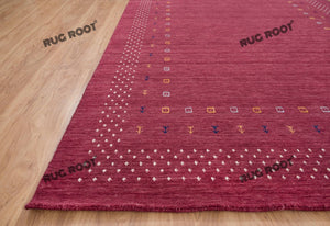 Handcrafted Moroccan Jewel | Vibrant Pink Gabbeh Rug with Tribal Motifs