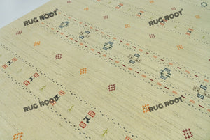 Handcrafted Simplicity | Multi-Color Accent Gabbeh Rug in Warm Beige Tones