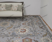 Load image into Gallery viewer, Handcrafted Turkish Oushak | Neutral Silver with Gray, Blue, Gold, and Rust Accents | Muted Modern Area Rug
