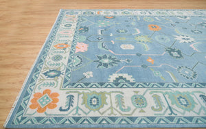 Frost & Flame | Hand-Knotted Turkish Rug in Blue & Ivory with Orange Accents