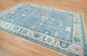 Frost & Flame | Hand-Knotted Turkish Rug in Blue & Ivory with Orange Accents