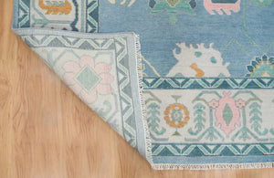 Frost & Flame | Hand-Knotted Turkish Rug in Blue & Ivory with Orange Accents