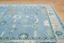 Load image into Gallery viewer, Frost &amp; Flame | Hand-Knotted Turkish Rug in Blue &amp; Ivory with Orange Accents
