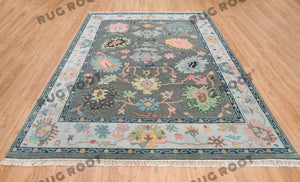 Midnight Garden | Handwoven Dark Grey & Blue Oushak Rug with Pink & Green Accents | Wool, Bedroom