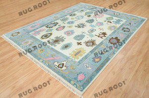 Ivory Elegance | Handwoven Oushak Rug with Baby Blue Accents