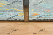 Load image into Gallery viewer, City Skyline Silhouette | Handwoven Oushak Rug | Light Blue with Pops of Color
