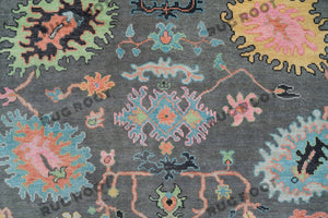 Midnight Garden | Handwoven Dark Grey & Blue Oushak Rug with Pink & Green Accents | Wool, Bedroom