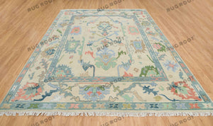 Serene Slumber Sand Oushak Rug with Coral, Green, and Pale Blue Accents