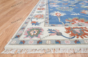 Sapphire Seascape | Handwoven Oushak Rug with Ruby Accents | Blue & Ivory