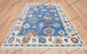 Sapphire Seascape | Handwoven Oushak Rug with Ruby Accents | Blue & Ivory